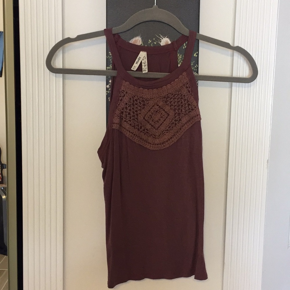 Super soft maroon tank top with front embroidery.